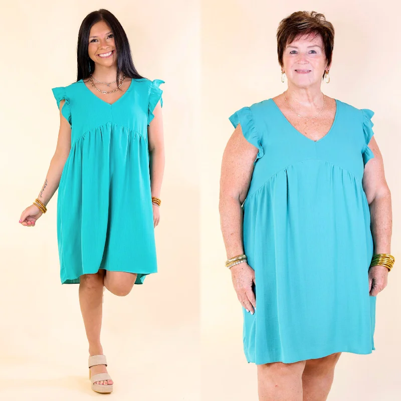 Mini dress with bold colors-Capture Your Attention V Neck Dress with Ruffle Cap Sleeves in Turquoise