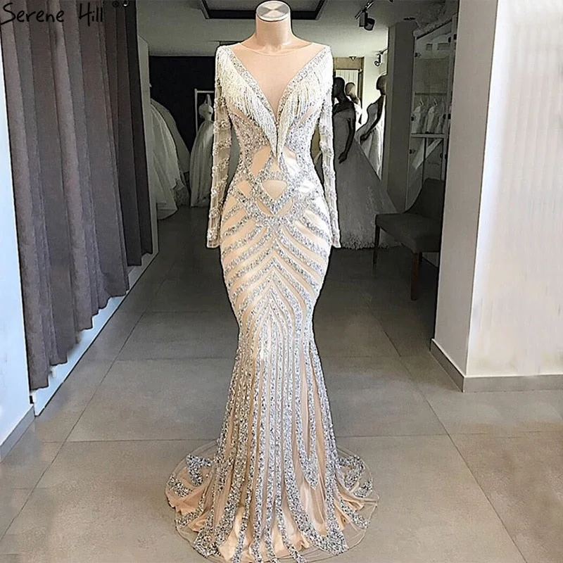 Evening dress with wrap design-On Sale no return no refundSale Nude Slim Mermaid Luxury Evening Dresses Long Sleeves Beading Tassel Fashion LA6594